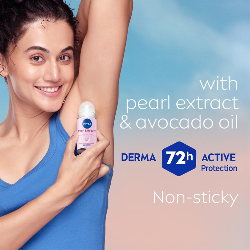 Woman applying Nivea Pearl and Beauty roll on deodorant for 72 hour sweat protection and smooth underarms