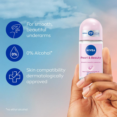 Woman applying Nivea Pearl and Beauty roll on deodorant for 72 hour sweat protection and smooth underarms